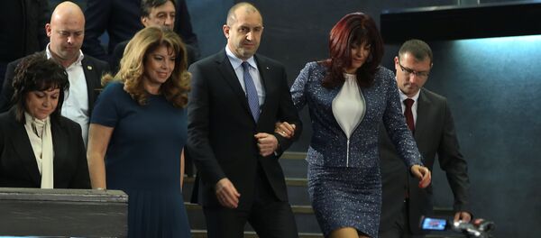 Presidential candidate of the Bulgarian Socialist Party Rumen Radev arrives for a news conference with his wife Desislava in Sofia, Bulgaria, November 13, 2016. Presidential candidate of the Bulgarian Socialist Party Rumen Radev arrives for a news conference with his wife Desislava in Sofia, Bulgaria, November 13, 2016. - Sputnik International