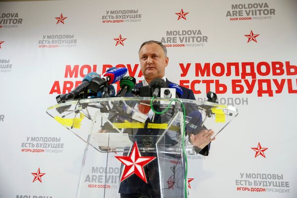 Moldova's Socialist Party presidential candidate Igor Dodon speaks to the media after a presidential election at his election headquarters in Chisinau, Moldova, November 14, 2016. Moldova's Socialist Party presidential candidate Igor Dodon speaks to the media after a presidential election at his election headquarters in Chisinau, Moldova, November 14, 2016. - Sputnik International