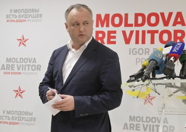 Socialist Party presidential candidate Igor Dodon leaves after a press briefing in Chisinau, Moldova, Sunday, Nov. 13, 2016. Socialist Party presidential candidate Igor Dodon leaves after a press briefing in Chisinau, Moldova, Sunday, Nov. 13, 2016. - Sputnik International