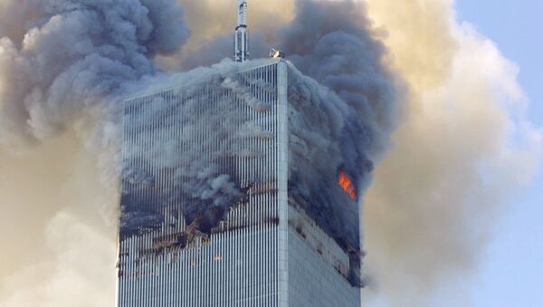 Fire and smoke billows from the north tower of New York's World Trade Center after terrorists crashed two hijacked airliners into the World Trade Center and brought down the twin 110-story towers. (File) - Sputnik International