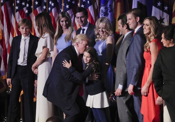 President elect Donald Trump greets members of his family after giving an his acceptance speech at an election night rally, Wednesday, Nov. 9, 2016, in New York. President elect Donald Trump greets members of his family after giving an his acceptance speech at an election night rally, Wednesday, Nov. 9, 2016, in New York. - Sputnik International