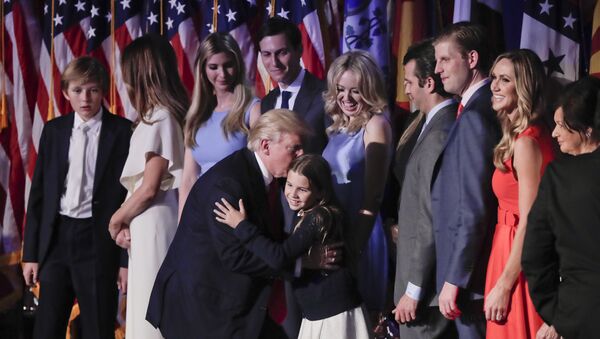 President elect Donald Trump greets members of his family after giving an his acceptance speech at an election night rally, Wednesday, Nov. 9, 2016, in New York. - Sputnik International