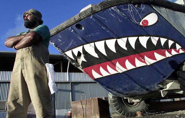 Qatia Brown, an engineer from Fiji, is one of several hundred migrant workers on the bankrupt island of Nauru, 14 September 2001, who have not received their wages for over a month. Qatia Brown, an engineer from Fiji, is one of several hundred migrant workers on the bankrupt island of Nauru, 14 September 2001, who have not received their wages for over a month. - Sputnik International