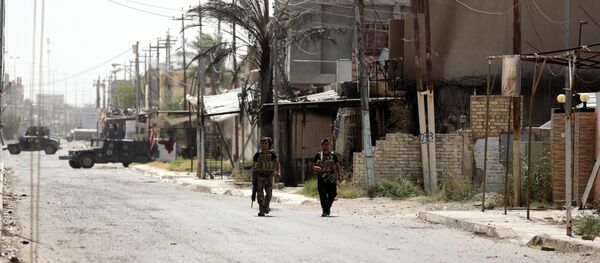 Members with Iraqi counter-terrorism forces patrol Fallujah, Iraq. (File) - Sputnik International