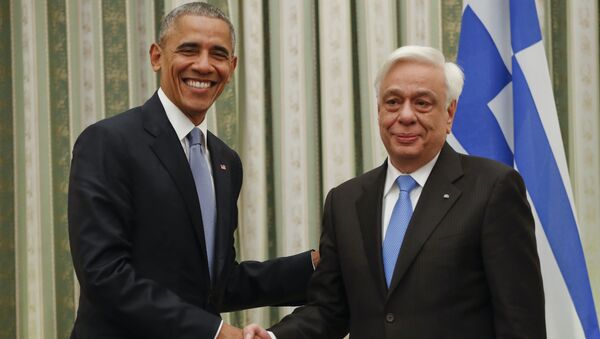 President Barack Obama shakes hands with his Greek counterpart Prokopis Pavlopoulos during their meeting at the Presidential Mansion in Athens - Sputnik International