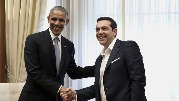 U.S. President Barack Obama, left, shake hands with Greek Prime Minister Alexis Tsipras during their meeting at Maximos Mansion in Athens - Sputnik International