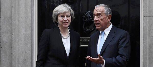 Britain's Prime Minister Theresa May greets Portugal's President Marcelo Rebelo de Sousa at Downing Street in London, Britain November 16, 2016. Britain's Prime Minister Theresa May greets Portugal's President Marcelo Rebelo de Sousa at Downing Street in London, Britain November 16, 2016. - Sputnik International