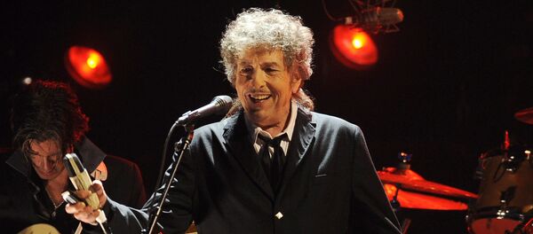 In this Jan. 12, 2012, file photo, Bob Dylan performs in Los Angeles In this Jan. 12, 2012, file photo, Bob Dylan performs in Los Angeles - Sputnik International