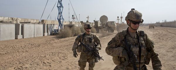 U.S. Army soldiers move through Qayara West Coalition base in Qayara, some 50 kilometers south of Mosul, Iraq, Wednesday, Nov. 9, 2016 U.S. Army soldiers move through Qayara West Coalition base in Qayara, some 50 kilometers south of Mosul, Iraq, Wednesday, Nov. 9, 2016 - Sputnik International