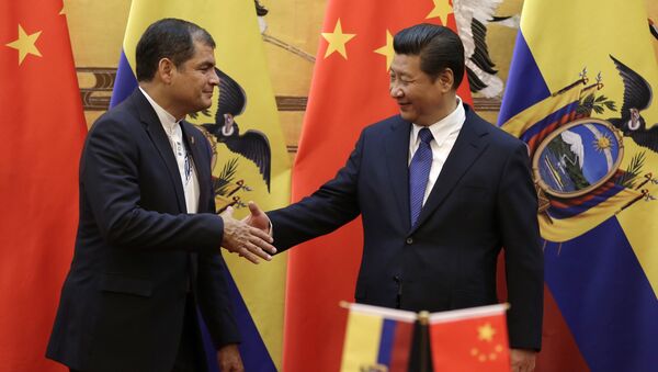 Chinese President Xi Jinping (R) shakes hands with Ecuador's President Rafael Correa after they witnessed a signing ceremony at the Great Hall of the People in Beijing (File) - Sputnik International