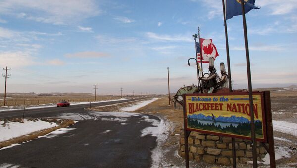 This Dec. 12,2012 photo shows a sign welcoming visitors to the Blackfeet Indian reservation on Dec. 12, 2012 - Sputnik International