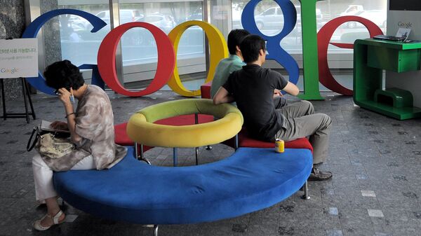 Visitors sit on a bench at a lobby of an office of Google Korea in Seoul on August 11, 2010 - Sputnik International