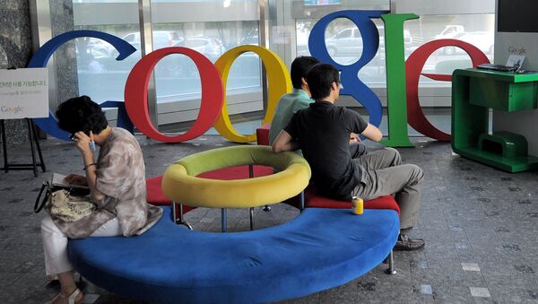 Visitors sit on a bench at a lobby of an office of Google Korea in Seoul on August 11, 2010 - Sputnik International