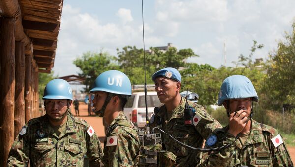 Japanese United Nations Mission in the Republic of South Sudan (UNMISS) troops wait for the arrival of the Japanese minister of defence at the UNMISS base in Tomping Juba on October 8, 2016 - Sputnik International