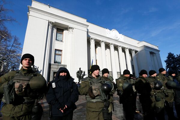 Members of the National Guard stand guard during a rally of depositors of failed Ukrainian banks who demand compensation of their deposits, in front of the parliament building in Kiev, Ukraine, November 15, 2016 Members of the National Guard stand guard during a rally of depositors of failed Ukrainian banks who demand compensation of their deposits, in front of the parliament building in Kiev, Ukraine, November 15, 2016 - Sputnik International