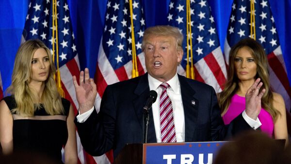 Donald Trump is joined by his daughter Ivanka, left, and wife Melania as he speaks during a news conference at the Trump National Golf Club Westchester, Tuesday, June 7, 2016, in Briarcliff Manor, NY. - Sputnik International
