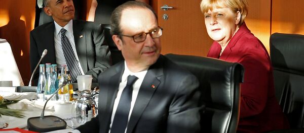French President Francois Hollande (C) looks up during a meeting with U.S. President Barack Obama, German Chancellor Angela Merkel (R) and other European leaders at the German Chancellery in Berlin, Germany November 18, 2016. French President Francois Hollande (C) looks up during a meeting with U.S. President Barack Obama, German Chancellor Angela Merkel (R) and other European leaders at the German Chancellery in Berlin, Germany November 18, 2016. - Sputnik International