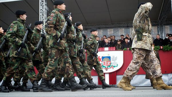 Latvian soldiers march during a military parade on November 18 (File) - Sputnik International