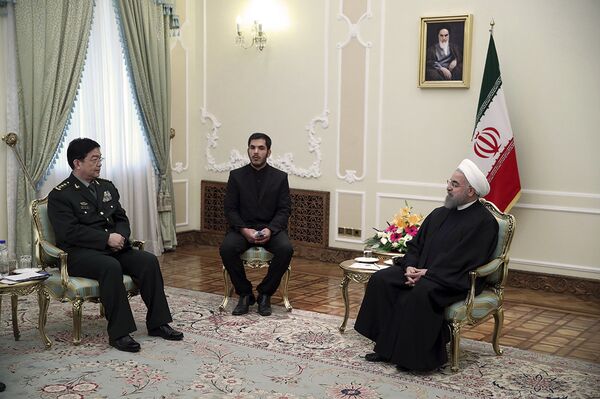 In this photo released by an official website of the office of the Iranian Presidency, President Hassan Rouhani, right, meets with Chinese Defense Minister Chang Wanquan, left, at his office, in Tehran, Iran, Tueday, Nov. 15, 2016 - Sputnik International