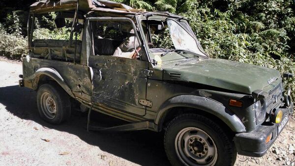 Bullet marks are seen on a damaged army vehicle at Pengeri in Assam's Tinsukia district on November 19, 2016, following an ambush attack by armed militants - Sputnik International