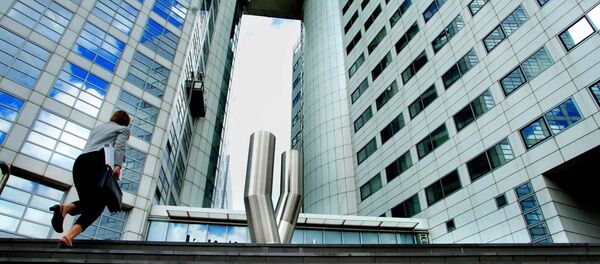 A woman walks up to the offices of the International Criminal Court (ICC) (File) - Sputnik International