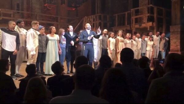 In this image made from a video provided by Hamilton LLC, actor Brandon Victor Dixon who plays Aaron Burr, the nation’s third vice president, in Hamilton speaks from the stage after the curtain call in New York, Friday, Nov. 18, 2016. Vice President-elect Mike Pence is the latest celebrity to attend the Broadway hit Hamilton, but the first to get a sharp message from a cast member from the stage. (Hamilton LLC via AP) - Sputnik International