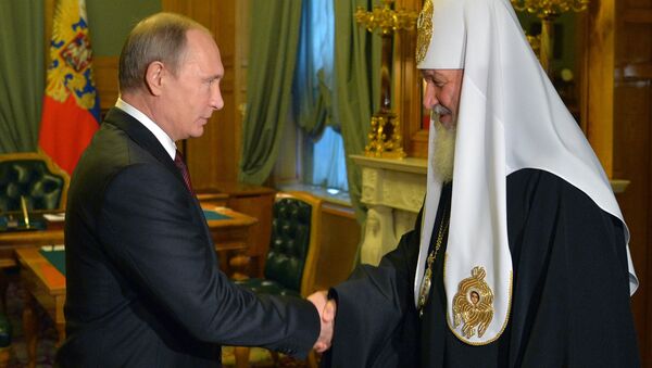 Russian President Vladimir Putin and Orthodox Patriarch Kirill during a meeting in Kremlin on November 21, 2015 - Sputnik International
