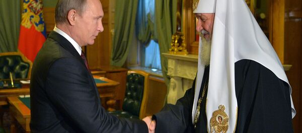 Russian President Vladimir Putin and Orthodox Patriarch Kirill during a meeting in Kremlin on November 21, 2015 - Sputnik International