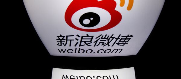 The chinese app Weibo's logo is displayed on a tablet in Paris. (File) The chinese app Weibo's logo is displayed on a tablet in Paris. (File) - Sputnik International