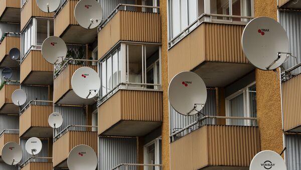 Satellite dishes are pictured on balconies at the Hovsjoe district in south-western Soedertaelje.The district is dominated heavily by people with different ethnic background than Swedish, in particular Assyrians / Syrians, Sweden Finns and Armenians. - Sputnik International