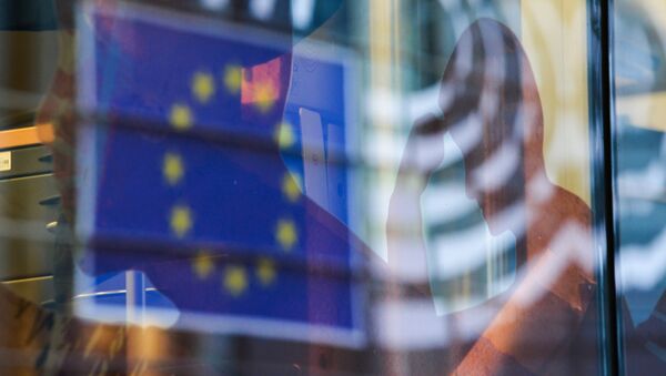 Reflection of the EU flag in a window of a building in Brussels. (File) - Sputnik International