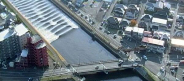 A tidal surge is seen in Sunaoshi River after tsunami advisories were issued following an earthquake in Tagajo, Miyagi prefecture, Japan November 22, 2016, in this video grab image released by Miyagi Prefectural Police via Kyodo A tidal surge is seen in Sunaoshi River after tsunami advisories were issued following an earthquake in Tagajo, Miyagi prefecture, Japan November 22, 2016, in this video grab image released by Miyagi Prefectural Police via Kyodo - Sputnik International