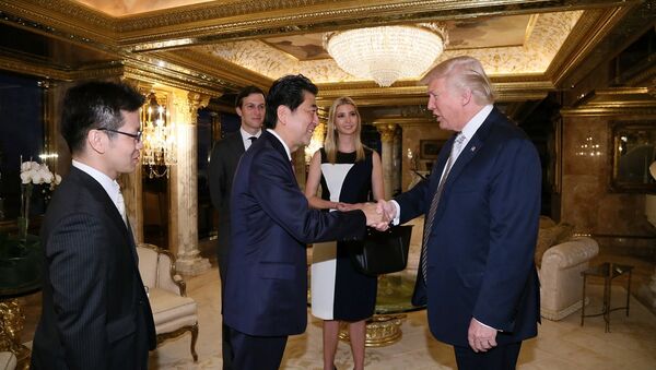 Japan's Prime Minister Shinzo Abe meets with U.S. President-elect Donald Trump (R) at Trump Tower in Manhattan, New York, U.S., November 17, 2016 - Sputnik International