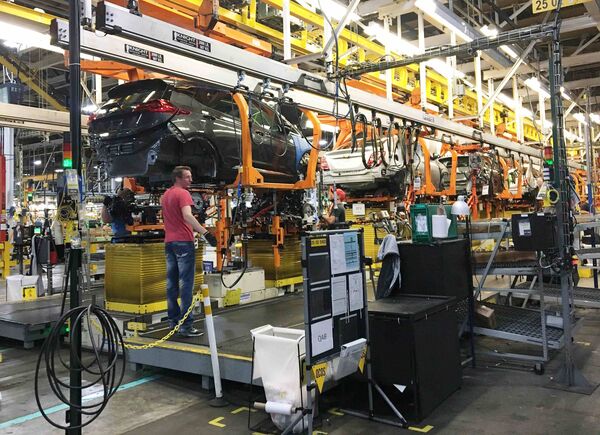 Workers assemble Chevy Volt EV cars at the General Motors assembly plant in Orion Township, Michigan, U.S. November 4, 2016 Workers assemble Chevy Volt EV cars at the General Motors assembly plant in Orion Township, Michigan, U.S. November 4, 2016 - Sputnik International