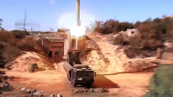 Oniks cruise missiles being launched from the Bastion mobile coastal defence missile system at terrorist targets in Syria. Still from a video provided by the Rusian Defense Ministry. - Sputnik International