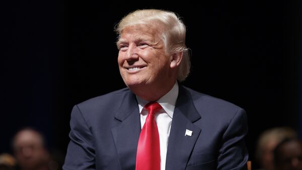 Donald Trump smiles during a town hall, Tuesday, Sept. 6, 2016, in Virginia Beach, Va. - Sputnik International