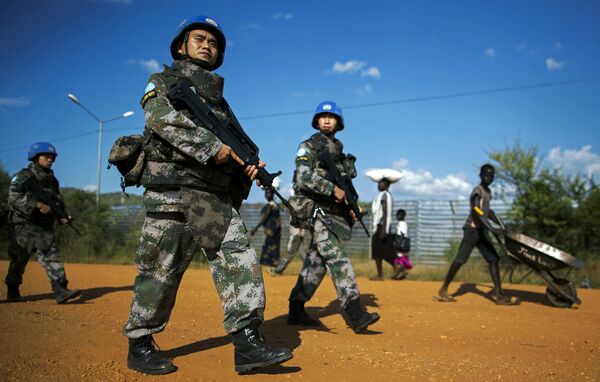 Peacekeeping troops from China, deployed by the United Nations Mission in South Sudan (UNMISS), patrol outside the premises of the UN Protection of Civilians (PoC) site in Juba on October 4, 2016 Peacekeeping troops from China, deployed by the United Nations Mission in South Sudan (UNMISS), patrol outside the premises of the UN Protection of Civilians (PoC) site in Juba on October 4, 2016 - Sputnik International