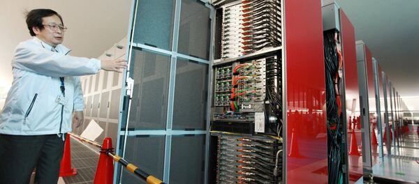 A staff member of Japan's national Riken institute opens a rack of the world's fastest supercomputer named the K Computer at Riken's laboratory in Kobe city in Hyogo prefecture, western Japan on June 21, 2011 A staff member of Japan's national Riken institute opens a rack of the world's fastest supercomputer named the K Computer at Riken's laboratory in Kobe city in Hyogo prefecture, western Japan on June 21, 2011 - Sputnik International