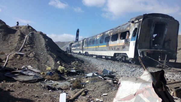 This picture released by Iranian Fars News Agency shows the scene of two trains collision about 150 miles (250 kilometers) east of the capital Tehran, Iran, Friday, Nov. 25, 2016 - Sputnik International