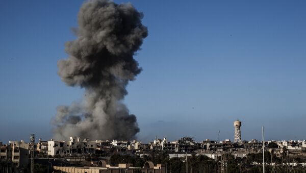 Smokes rises after an airstrike on an Islamic State militants held area in Sirte, Libya (File) - Sputnik International
