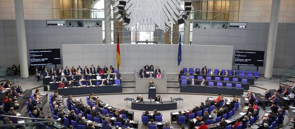 German Chancellor Angela Merkel speaks during a meeting at the lower house of parliament Bundestag on 2017 budget in Berlin, Germany, November 23, 2016 German Chancellor Angela Merkel speaks during a meeting at the lower house of parliament Bundestag on 2017 budget in Berlin, Germany, November 23, 2016 - Sputnik International