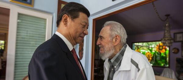 In this July 22, 2014 file photo, Cuba's Fidel Castro, right, greets China's President Xi Jinping in Havana, Cuba In this July 22, 2014 file photo, Cuba's Fidel Castro, right, greets China's President Xi Jinping in Havana, Cuba - Sputnik International