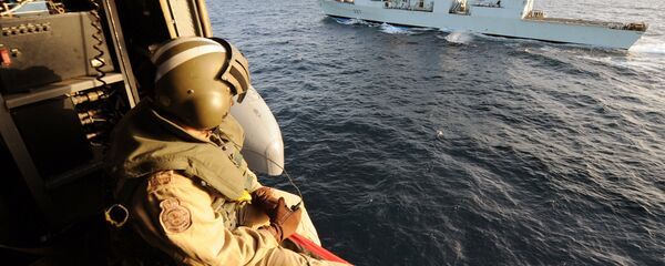 Canadian helicopter Sea-King of the military ship Fredericton flies near Canadian military boat during a flying security patrol on January 9, 2010 in the Aden Gulf Canadian helicopter Sea-King of the military ship Fredericton flies near Canadian military boat during a flying security patrol on January 9, 2010 in the Aden Gulf - Sputnik International