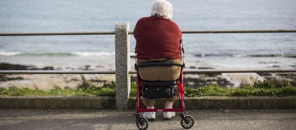 An elderly man looks out to sea in Falmouth, south west England on March 10, 2015 An elderly man looks out to sea in Falmouth, south west England on March 10, 2015 - Sputnik International