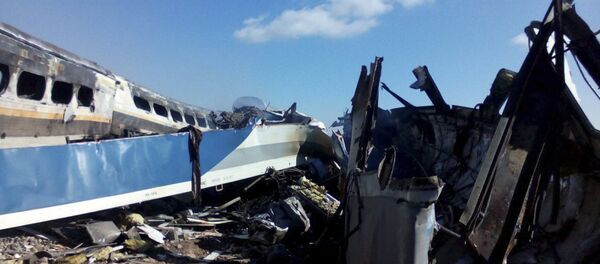 This picture released by Iranian Fars News Agency shows the scene of two trains collision about 150 miles (250 kilometers) east of the capital Tehran, Iran, Friday, Nov. 25, 2016 This picture released by Iranian Fars News Agency shows the scene of two trains collision about 150 miles (250 kilometers) east of the capital Tehran, Iran, Friday, Nov. 25, 2016 - Sputnik International