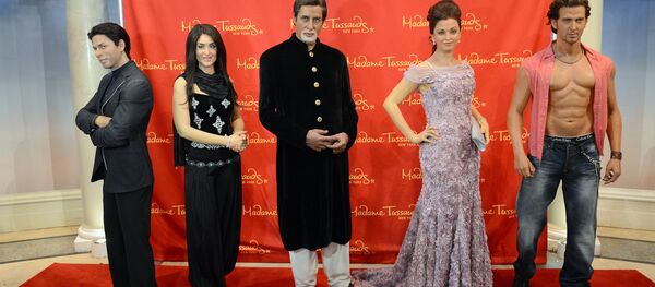 Wax figures of Indian movie stars (L-R) Shah Rukh Khan, Kareena Kapoor, Amitabh Bachchan, Aishwarya Rai and Hrithik Roshan are on display during the unveiling of a travelling exhibit featuring five wax figures of Bollywood's top star at Madame Tussauds in New York. (File) Wax figures of Indian movie stars (L-R) Shah Rukh Khan, Kareena Kapoor, Amitabh Bachchan, Aishwarya Rai and Hrithik Roshan are on display during the unveiling of a travelling exhibit featuring five wax figures of Bollywood's top star at Madame Tussauds in New York. (File) - Sputnik International