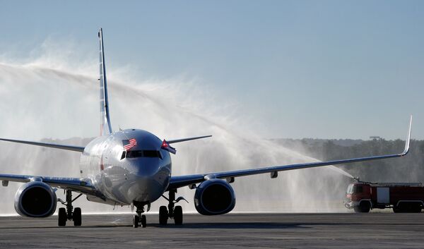 An American Airlines plane arrives at Jose Marti International Airport becoming the first Miami-Havana commercial flight in 50 years, coinciding with the beginning of the tributes to late Cuban leader Fidel Castro, on November 28, 2016 in Havana An American Airlines plane arrives at Jose Marti International Airport becoming the first Miami-Havana commercial flight in 50 years, coinciding with the beginning of the tributes to late Cuban leader Fidel Castro, on November 28, 2016 in Havana - Sputnik International