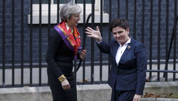 Britain's Prime Minister Theresa May (L) greets her Polish counterpart Beata Szydlo in front of 10 Downing Street in central London, Britain November 28, 2016. - Sputnik International