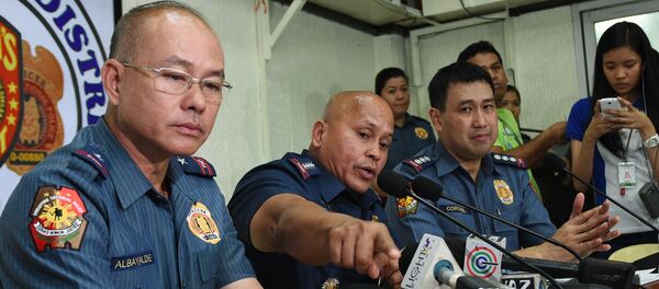 Philippine police chief Director-General Ronald Dela Rosa talks about the improvised explosive device found by a street sweeper near the US embassy during a press conference at the police headquarters in Manila Philippine police chief Director-General Ronald Dela Rosa talks about the improvised explosive device found by a street sweeper near the US embassy during a press conference at the police headquarters in Manila - Sputnik International