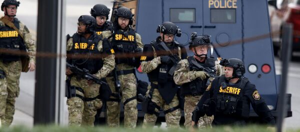 Law enforcement officials are seen outside of a parking garage on the campus of Ohio State University as they respond to an active attack in Columbus, Ohio Law enforcement officials are seen outside of a parking garage on the campus of Ohio State University as they respond to an active attack in Columbus, Ohio - Sputnik International